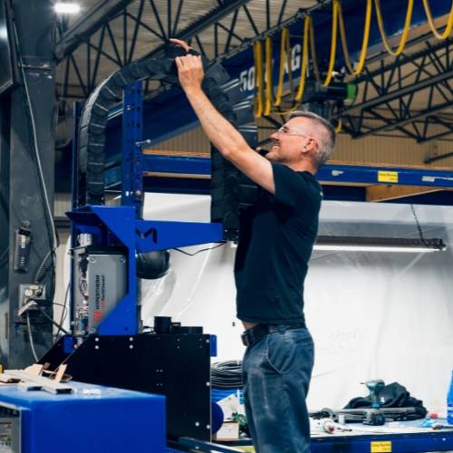 Machitech employee working on the Machine in their Manufacturing Plant