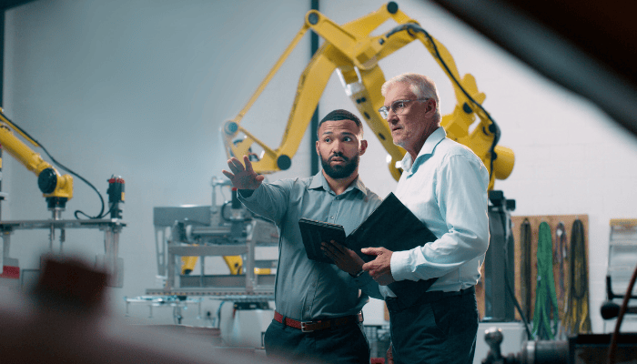 Two manufacturers are working on the shop floor